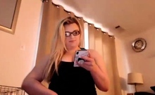 Chubby Tranny stroking her shaved cock