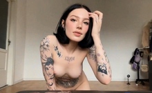 Sensual Tattooed Shemale Strokes Her Cock