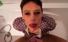 Short hair mature takes facial in the bathtub